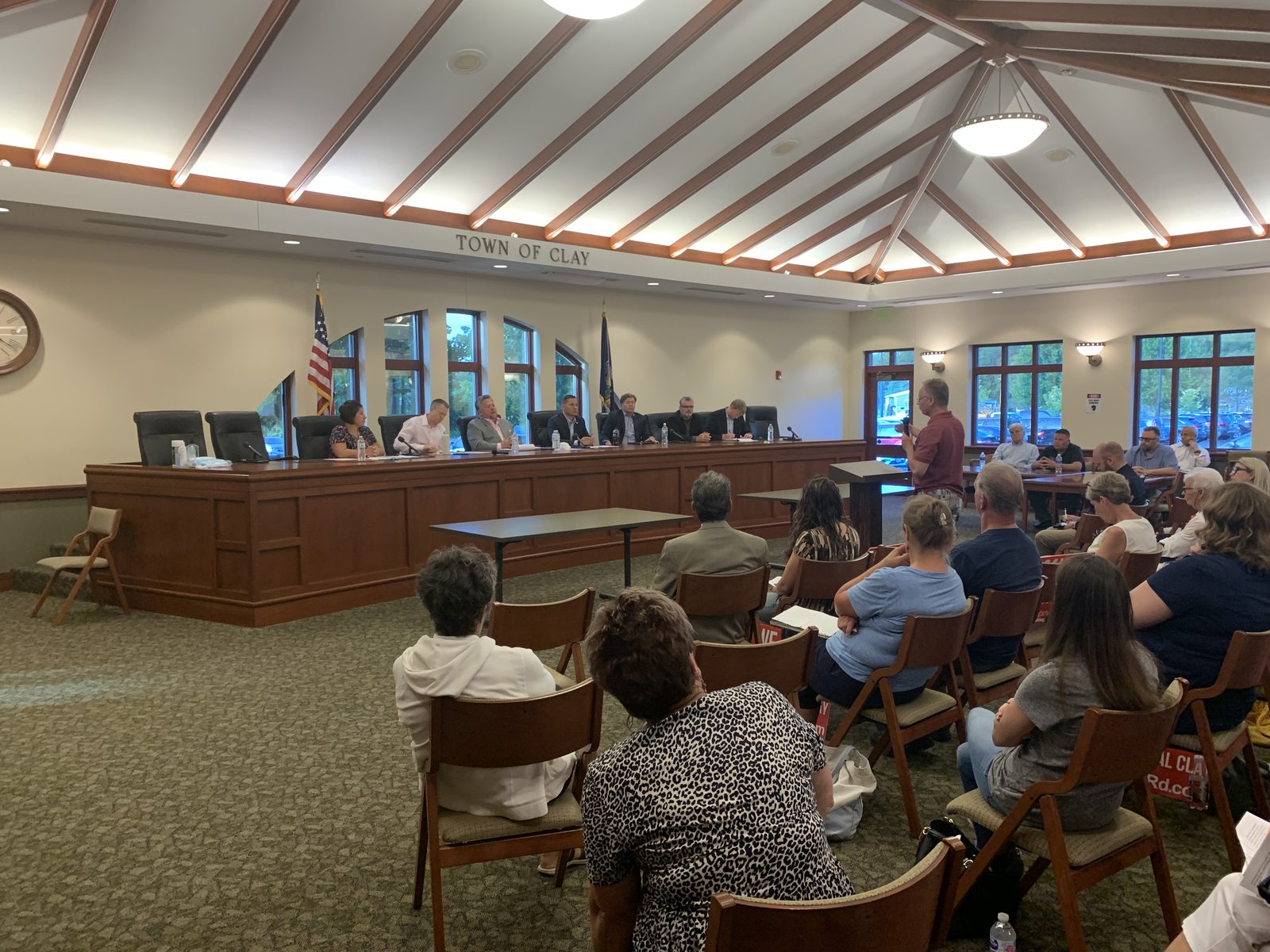 A public meeting in the Town of Clay board room